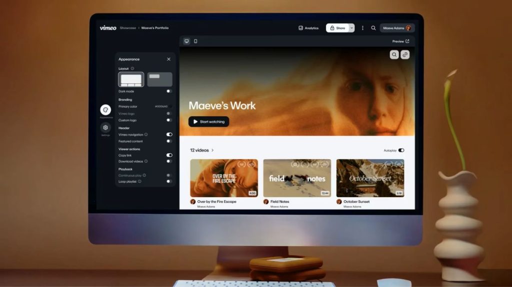 A desktop computer displaying a Vimeo video portfolio page with customization settings, a featured video banner, and a row of cinematic video thumbnails.
