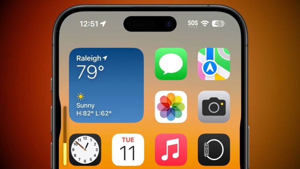 Close-up of an iPhone home screen showing the volume slider beside app icons and a weather widget, highlighting hidden iPhone volume button features.
